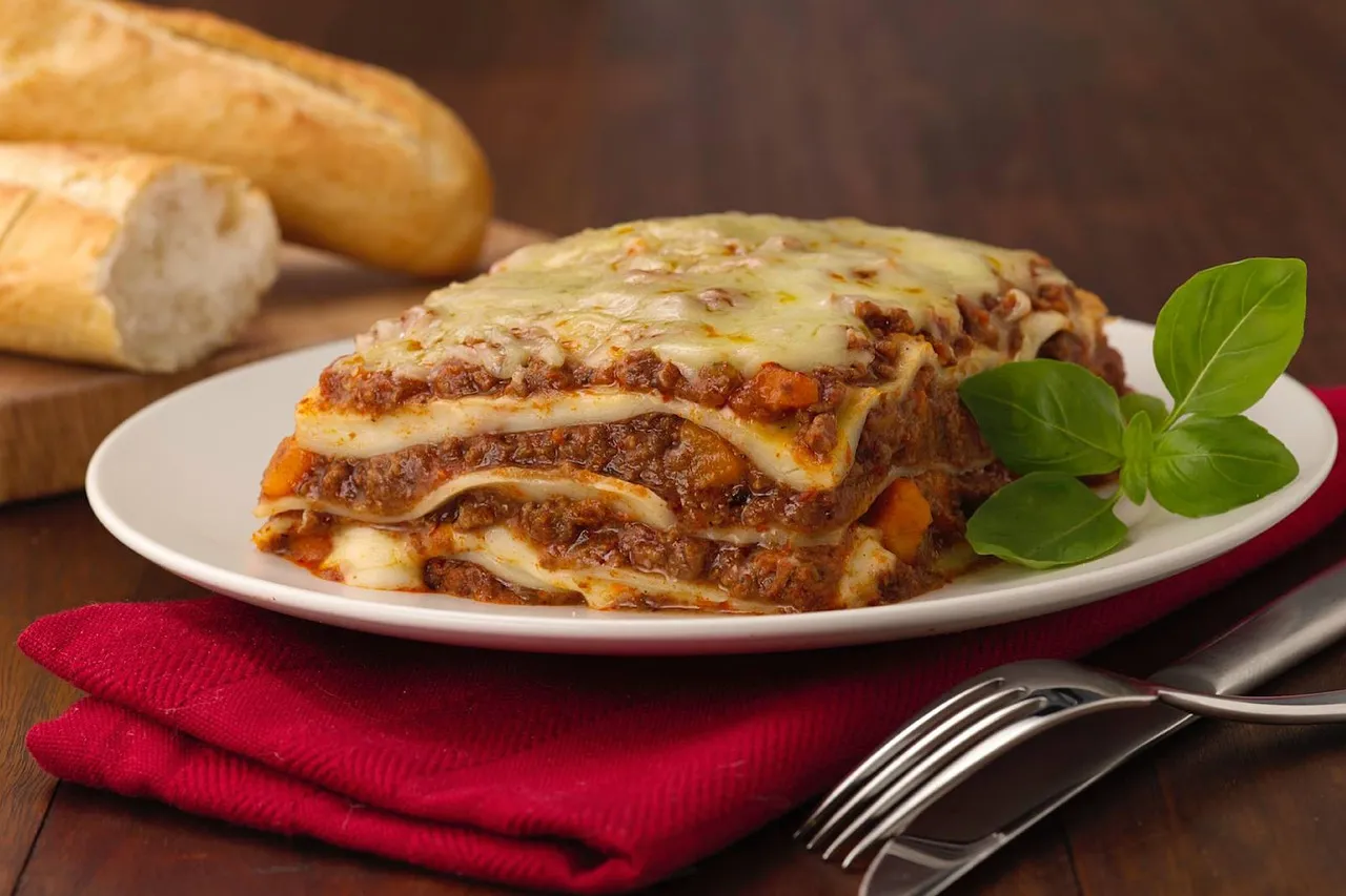 Lasagna with basil garnish