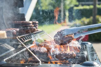 Jigsaw puzzle of Grilling burgers outdoors