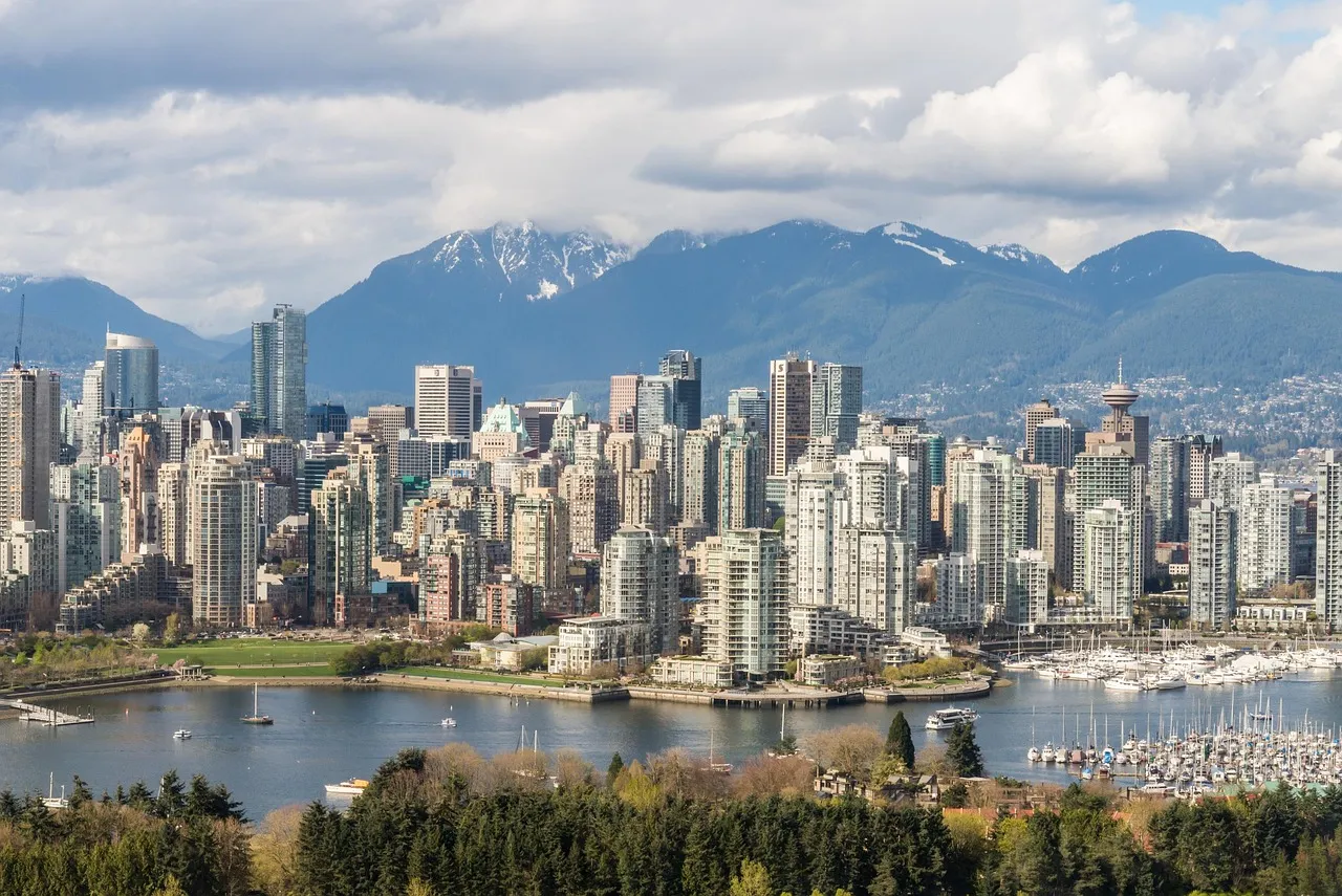 Cityscape with mountains backdrop